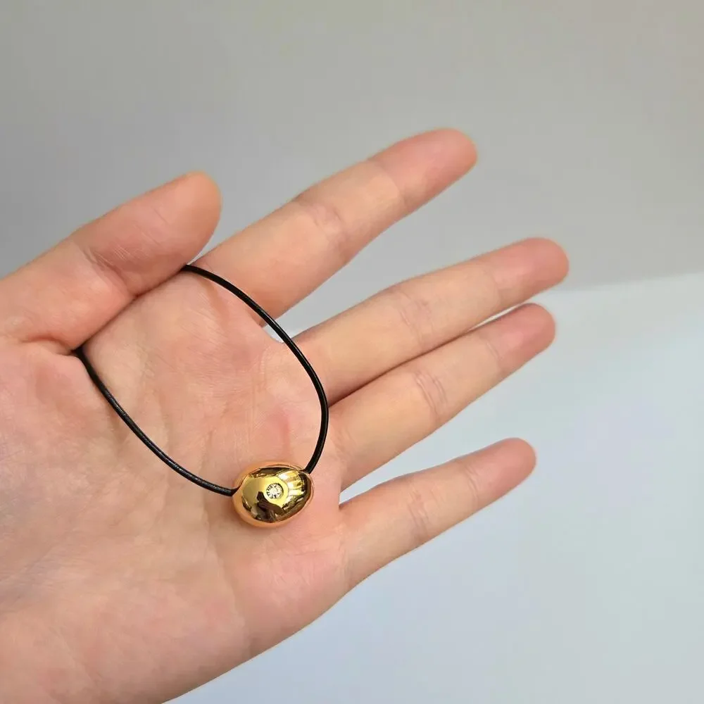 NIB Ettika Pavé Polished Pebble Leather Cord Pendant Necklace 18K Gold Plated